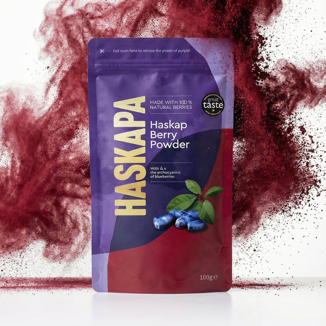 Haskapa Haskap Berry Powder packaging with red powder splash on a white background
