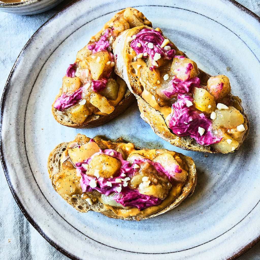 Peanut butter toasts with warm pears and berry swirl yogurt