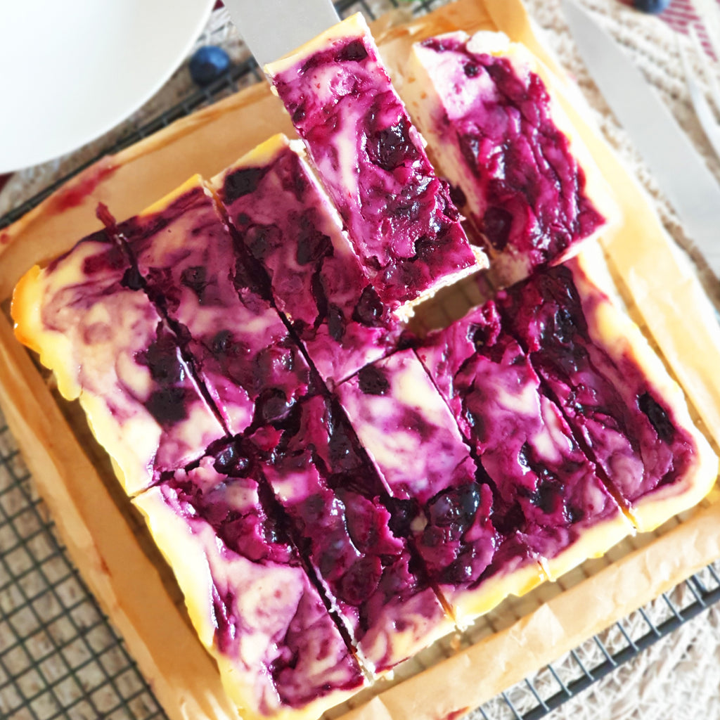 Blueberry and Haskap Swirl Cheesecake Bars